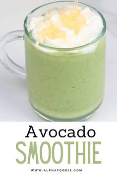 avocado smoothie in a glass with whipped cream on top and the words avocado smoothie above it