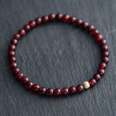 Want to save 15% off your first order? Sign up for our newsletter by visiting our website and filling out the pop up form. Receive a code by email, then send us that code through Etsy messages to save 15% off your ETSY order, sign up here: www.earthlyabundancejewelry.com  This gorgeous AAAA+ garnet is available in two options: #1 Solid 14K gold rondel #2 Solid 14K gold corrugated bead D E T A I L S △ Handmade in Vancouver △ Solid 14K gold corrugated [optional] △ Solid 14K gold rondel [optional] Devil Costume, Gemstone Properties, Cotton Gift Bag, Tiny Beads, Garnet Bracelet, Rishikesh, Garnet Gemstone, Gemstone Bracelets, Bracelet Stack