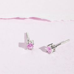 These forever classic screw-back earrings feature bright and stunning cubic zirconia in a prong setting. Crafted entirely in 925 sterling silver with a cubic zirconia stone, they are hypoallergenic and safe for children with sensitive ears. They feature a threaded earring post and back to ensure your child's earrings stay safely and comfortably in place. A complimentary gift box is included. Pink Diamond Earrings In Sterling Silver, Silver Birthstone Earrings With Cubic Zirconia, Silver Cubic Zirconia Birthstone Earrings, Sterling Silver Diamond Earrings With Birthstone For Gift, Round Solitaire, Earring Post, Kids Earrings, Screw Back Earrings, Sensitive Ears