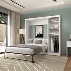 a bedroom with blue walls and white furniture