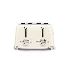 a white toaster sitting on top of a table