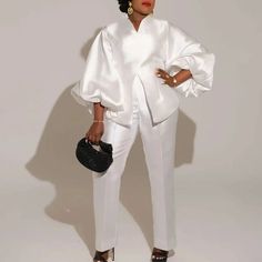 This Elegant White African Matching Set for Women is a chic and versatile outfit perfect for both evening parties and casual summer occasions. Combining the timeless elegance of classic white with the modern flair of African-inspired fashion, this two-piece set embodies sophistication and comfort. Designed for the stylish woman who appreciates contemporary Nigerian style, this outfit is ideal for making a statement at any event. Design Overview Set Composition: The matching set includes two piec Pencil Skirt Fall, Ladies Outfits, Plus Size Two Piece, Nigerian Styles, African Inspired Fashion, High Waisted Pencil Skirt, Stylish Sandals, Versatile Outfits, Womens Clothing Stores