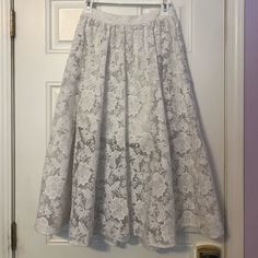 Gorgeous Midi Length White Floral Skirt. Slip Inside And Sheer Overlay. Never Worn And Still With Tags. Small Stain (Shown) And Stain On Slip. Both Could Be Removable With Dry Cleaning. Bought At Anthropologie Elegant White Maxi Skirt For Brunch, Spring Flared Maxi Skirt With Lace Trim, Elegant Spring Maxi Skirt With Lace Trim, Spring Wedding Lace Maxi Skirt, White Elegant Maxi Skirt For Brunch, Elegant Skirt With Lace Trim For Brunch, Chic Spring Maxi Skirt With Lace Trim, Spring Lace Trim Flared Maxi Skirt, Lace Full Skirt Bottoms For Spring