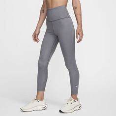 Up for a workout or down to chill, these cozy, heat-regulating leggings are ready for whatever you are. Whether you’re hitting the trails or running errands, the soft, stretchy fabric and multiple pockets help keep you comfortable and prepared. Plus, they're thick enough to keep you covered, so you can stay confident in your deepest bend. Nike Yoga Pants For Sports, Nike Moisture-wicking High-stretch Bottoms, Nike High Stretch Moisture-wicking Bottoms, Nike Functional Compression Activewear, Nike Functional Yoga Bottoms, Functional Nike Compression Activewear, Nike Go-dry Leggings For Sports, Nike Sporty Leggings For Sports, Winter Workout Moisture-wicking Leggings