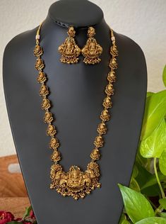 An elegant set for your local gatherings or parties. The length of the antique kemp AD haram is given in one of the pictures. Measurements of the jhumkas. Height: 5.5 Cm  Width : 3.5 Cm  Care Instruction : Avoid Heat & Chemicals Like Perfume, Deo, Alchol, Etc. | Clean With Dry Cotton Cloth | Pack In our Anti tarnish box after use. Lakshmi Haar Gold, Long Temple Jewellery Necklace, Antique Gold Haram Designs, Temple Necklace Jewellery, 32 Grams Gold Haram Designs, Antique Gold Jewelry Indian Necklaces, Antic Jewellery Designs, Temple Jewellery Haram, Antique Haram Designs Gold