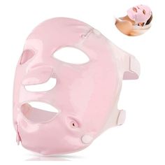 a pink mask with holes in the middle and a pig on it's face