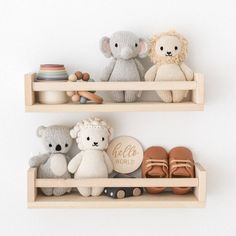 two wooden shelves filled with stuffed animals on top of each other and shoes next to them