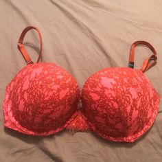 Bright Pink And Dark Orange Lace Embellished Push Up Bra From The Vs Very Sexy Collection, Nwt Pink Underwire Bra For Party, Pink Low-cut Padded Bra, Low-cut Padded Pink Bra, Party Pink Bra With Padded Cups, Pink Underwire Bra For Night Out, Pink Padded Party Bra, Pink Party Bra With Lined Body, Pink Stretch Party Bra, Pink Stretch Bra For Party