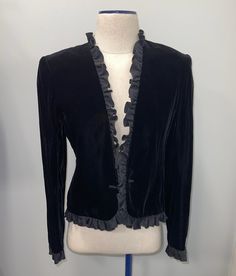 Description: Black velvet jacket with chiffon frills, evening wear Measurements Sleeve: 24 in Length: 21 in Size: 8 Material: Velvet jacket with chiffon frills Velvet Jackets Women Indian, Velvet Jackets Women, Velvet Jackets, Black Velvet Jacket, Arlington Va, Womens Jackets, Evening Jackets, Velvet Jacket, Evening Wear