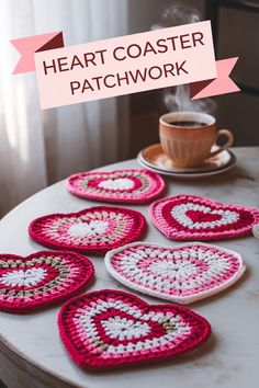 crocheted heart coasters on a table with coffee cup and saucer in the background