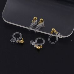 20pcs Invisible clip on earring converter, resin earring clip, no pierced dangle earrings clip findings, hypoallergenic clip earrings -Item Details Size: 11 x 11mm Material: 316L stainless steel, PC resin Color: Gold, Silver, Steel Color Quantity: 20pcs (10 pairs) If you have any other questions, please feel free to contact me :) Resin Earring, Clip On Earring, Earrings Clip, Clip Earrings, Wedding Earrings, Earings Piercings, Ear Wires, Jewelry Care, Alex And Ani Charm Bracelet