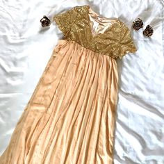 Nwt, Sparkly Top, Double Lined Gown. Sparkle Falls Just Under Breast. Skirt Part Measures 37.5”. Under Bust Measures 15.5” Across But Is Elastic So It Will Stretch If Needed. Sparkly Top Measures 11” From Top Of Shoulder/Neckline To Elastic Part. Gold Flowy Dress For Party, Flowy Gold Dress For Party, Gold Flowy Party Dress, Gold Flowy Dress For Spring, Flowy Gold Dress For Spring, Flowy Spring Festive Dress, Flowy Festive Spring Dress, Gold Summer Holiday Dress, Spring Sequin Maxi Dress With Short Sleeves