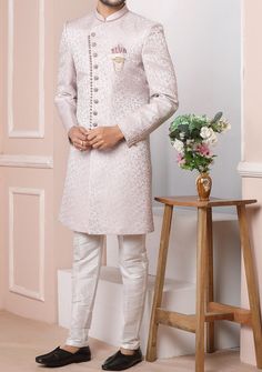 Ready-Made Sherwani With Trouser. Jacquard Brocade Fabric Top. Art Dupion Aligarhi Ready Made Trouser. Crafted in Chinese Collar Neck, and Full Sleeve. Satin Lining with Plain Work. High-Quality Matching Buttons. Please Note: The footwear shown in the picture is for presentation and photography purpose only. Color: There might be slight color variation due to lightings and flashes while photo shooting. The color may also vary because of different screen resolutions. Wash Care: Dry Clean Only. Western Party Wear, Indo Western Sherwani, Western Party, Western Parties, Chinese Collar, Readymade Saree, Dupion Silk, Collar Neck, Silk Trousers