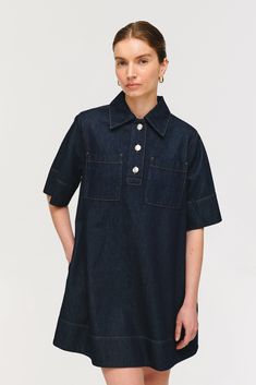 A denim mini dress is a versatile piece in any wardrobe. Our Grace dress is a contemporary take on the classic silhouette with statement contrast buttons, front pockets, and pleat detailing on the back for movement. Wear on its own with boots to create a bold look or style over jeans in the same wash for a modern take on the denim-on-denim trend.