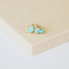 ★ This item is made to order. Please check the shipping section for current processing times. *TINY* Turquoise Studs(Perfect for second piercings or minimalist looks! Available as a single stud or a pair!)When you pair raw, genuine turquoise with a 14-karat gold-plated setting, you bring sheer magic to your ear game. These dainty turquoise stud earrings are the perfect choice to pair with our larger stud earring collection as a double piercing, as mismatched earrings with another piece from our Dainty Turquoise Earrings For Everyday, Second Piercings, Raw Crystal Earrings, Mood Stone, December Birthday Gifts, Raw Turquoise, Double Piercing, Large Stud Earrings, December Birthday