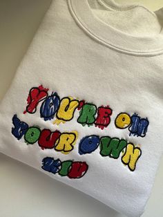 choose either white, ash, or black black will have the outline in white You Are On Your Own Kid, T Shirt Design Embroidery, Cute Embroidery Sweatshirts & Hoodies, Make T Shirt Cute, Graphic Design Sweatshirt, Cute Outfit Styles, Funny Crewneck Sweatshirt, Embroidered Clothes Sweatshirts & Hoodies, Cute Outfits With Hoodies