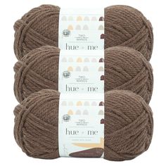 three skeins of yarn in brown and beige colors, with the words hue me on