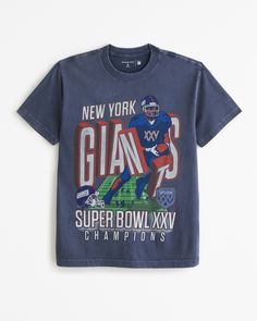 Comfortable short-sleeve tee in our softAF fabric and relaxed-fit silhouette, featuring New York Giants-inspired graphic detail at chest and crew neckline. Imported Giants Shirt, Nfl San Francisco, Men's Tops, San Francisco 49ers, New York Giants, Mens Graphic Tee, Abercrombie Fitch, Crew Neckline, Graphic Tee