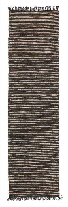 a brown and black rug with fringes on it's edges, against a white background