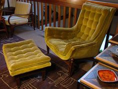 a living room filled with furniture and decor