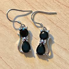 Adorable Halloween Black Cat Dangle Earrings Sterling Silver Earrings. Measure 5/8" In Height. Makes A Great Gift Or Just For Yourself!!! Comes With A Gift Box. Elegant Cat Ears Jewelry With Cat Design, Silver Cat Ears Jewelry, Black Cat Ears Jewelry With Cat Design, Black Cat Design Earrings For Halloween, Party Jewelry With Cat Design And Cat Ears, Black Cat Design Drop Earrings, Party Jewelry With Cat Design, Elegant Cat Design Jewelry For Party, Elegant Party Jewelry With Cat Design