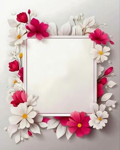 a white frame with pink and white flowers on the bottom is surrounded by red and white petals