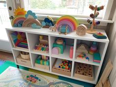 a child's play room with toys on the shelves