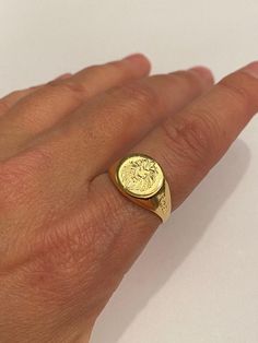 "Lion Signet Ring - Pinky Ring - Men / Women Engraved Ring - Family Crest - Personalized Ring - Best quality 18k Gold Plate Special engraving technique using which create the appearance of crest or other images of your choice. Seal Diameter: 12mm Please note in the \"notes to seller\" at checkout. : * your ring size * letter / picture / name/s / Sentence / Inspiration / Drawing / crest - you want me to engrave If you have any questions please feel free to contact The product will arrive to you p Vintage Engraved Round Ring, Tarnish Resistant, Vintage Tarnish-resistant Round Rings, Adjustable Round Signet Ring, Adjustable Round Signet Ring Stamped 14k, Adjustable Round 14k Stamped Signet Ring, Lion Signet Ring, Mens Gold Signet Rings, School Girlfriend, Wax Seal Ring