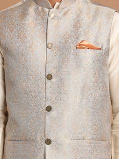 VASTRAMAY Men's Grey Silk Blend Woven Nehru Jacket A sophisticated take on the classic Nehru jacket, this VASTRAMAY piece is crafted from a luxurious silk blend fabric for a touch of elegance. Key Features: Material: Silk Blend Color: Grey Style: Nehru Jacket Woven design Button closure Multiple pockets Specifications: Brand: VASTRAMAY Size Options: S, M, L, XL, XXL Fit: Regular Occasion: Casual, Festive, Party Care Instructions: Dry clean only Material & Care: The jacket is made of a luxurious Classic Nehru Jacket For Festive Semi-formal Occasions, Classic Bandhgala With Stand Collar For Festive Occasions, Tailored Elegant Nehru Jacket For Ceremonial Occasions, Elegant Tailored Nehru Jacket For Ceremonial Occasions, Elegant Tailored Nehru Jacket For Ceremonial, Festive Nehru Jacket With Stand Collar For Formal Occasions, Formal Festive Nehru Jacket With Stand Collar, Festive Formal Nehru Jacket With Stand Collar, Classic Nehru Jacket With Stand Collar For Festive Occasions