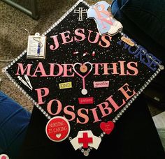 a graduation cap with the words jesus made this possible written on it and other decorations