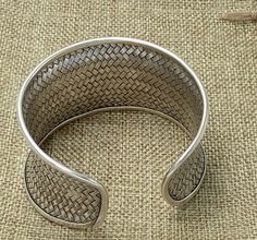 "Braided Sterling Silver Statement Boho Cuff Bracelet, Handmade Wide Woven white Silver Ethnic Bangle, Tribal Weave Adjustable Cuff Width: Front side 1 9/16 inches (1.6\") / 4cm Longer versions (2.75\" and 4.3\"): https://www.etsy.com/listing/603575462 https://www.etsy.com/listing/569455658 Metal Purity: 95% Silver (Purer than 925 Sterling Silver) We also have designs version of Braided cuff : https://www.etsy.com/listing/253985429/wide-woven-silver-cuff-bracelet-extra?ref=shop_home_active_24 An Adjustable Woven Cuff Bracelet, Traditional Woven Bracelet Jewelry, Traditional Woven Bangle Jewelry, Traditional Woven Bangle, Traditional Woven Bracelet, Adjustable Cuff Bangle In Traditional Style, Adjustable Handwoven Traditional Cuff Bracelet, Traditional Adjustable Cuff Bangle, Bohemian Woven Cuff Bangle Bracelet