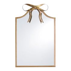 a mirror with a bow on the front and back of it, against a white background