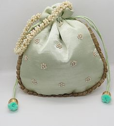 "ethnic traditional indian wedding gota patti zardosi embroider potli bag handbag for woman | potli bag for return gift | indian wedding gift Package Contents: 1 Size: 10\" x 8\" Designed with the heart, this beautiful Potli or batawa bag are eye catchy and made of premium material. Key Features: Ark Work. This potli is good match with both Indian and western outfits and are superb for wedding and festive parties. This would be best complement to your designer saree, lenhga or any other kind of Traditional Resham Embroidery Potli Bag For Festive Season, Traditional Bags With Resham Embroidery For Festive Occasions, Bollywood Style Festive Bags With Resham Embroidery, Green Potli Bag For Wedding, Elegant Green Potli Bag For Festivals, Traditional Resham Embroidered Potli Bag For Diwali, Traditional Potli Bag With Resham Embroidery For Festivals, Green Zari Work Potli Bag For Wedding, Traditional Resham Embroidery Potli Bag For Diwali