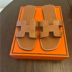 Hermes Women’s Sandals In Brown Size 40 Gently Used Luxury Tan Open Toe Sandals, Elegant Tan Sandals For Vacation, Luxury Tan Flat Heel Sandals, Hermes Shoes Women, Hermes Women, Hermes Sandals, Hermes Shoes, Shoes Women, Women's Shoes Sandals