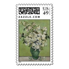 a postage stamp with a painting of white flowers in a vase on a green background