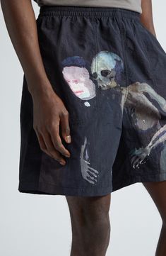 Artwork by Berlin-based painter and sculptor Helen Verhoeven brings an element of the macabre to these pull-on shorts crafted of nylon taffeta. Elastic waist Side-seam zip pockets; back zip pocket 100% nylon Dry clean Imported Designer Clothing Asian Owned/Founded Helen Verhoeven, Painter Outfit, Casual Shorts For Men, Black Artwork, Belted Shorts, Track Shorts, Print Shorts, Board Shorts, Sculptor