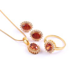 This Sterling Silver Jewelry set features an Elegant Art With Natural Hessonite Gemstone. The cavity is made from genuine solid 925/92.5 Sterling silver with 18k Gold Plating and stamped as S925. This Jewelry is Lead free. ITEM DESCRIPTION Item Code: JACBS1/45 Metal: 18k Gold / Rose Gold Plated over 925/92.5 Sterling Silver Gemstone: Genuine Natural Hessonite Gemstone Shape: Oval Gemstone Size: 6 X 8 MM Ring Dimension:- Length: 12 MM Width: 11 MM Weight: 3.93 gm approx Earrings Dimension:- Lengt Elegant Amber Gemstone Jewelry, Wedding Rings In Yellow Gold With Matching Earrings, Yellow Gold Wedding Rings With Matching Earrings, Oval Gold Plated Jewelry With Polished Finish, Fine Jewelry Amber Gemstone, Fine Jewelry Amber With Polished Finish, Formal Yellow Gold Jewelry Sets With Gemstones, Formal Yellow Gold Gemstone Jewelry Sets, Oval Gemstone Gold-plated Jewelry