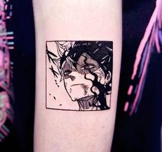 a woman's arm with a black and white drawing on it