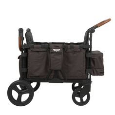 a stroller with wheels and two large bags on the front, one is brown