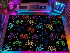 a gaming room with neon colored video game controllers on the floor