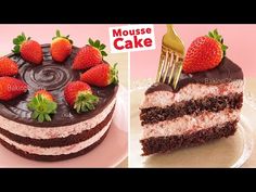 there is a cake with chocolate frosting and strawberries on top