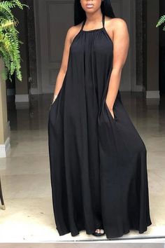 Casual Backless Ankle Length Dress Flowy Solid Color Halter Neck Maxi Dress, Flowy Halter Neck Solid Maxi Dress, Flowy Halter Neck Maxi Dress In Solid Color, Casual Sleeveless Plain Maxi Dress, Black Flowy Halter Neck Maxi Dress, Flowy Black Maxi Dress With Halter Neck, Plain Maxi Dress For Beach, Casual Stretch Halter Maxi Dress, Casual Black Halter Maxi Dress