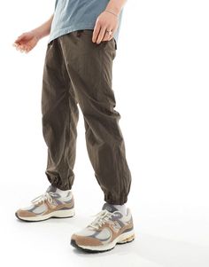 Trousers & Chinos.by Gramicci.Fancy pants.Regular rise.Elasticated waistband.Concealed fly.Zip cuffs.Regular fit.Product Code: 133726884 Sporty Brown Bottoms With Elastic Waistband, Brown Tapered Leg Cargo Pants With Elastic Waistband, Sporty Brown Bottoms For Spring, Stretch Brown Pants For Streetwear, Brown Stretch Casual Cargo Pants, Stretch Brown Bottoms For Streetwear, Casual Stretch Brown Cargo Pants, Brown Stretch Bottoms For Streetwear, Sporty Brown Bottoms For Outdoor