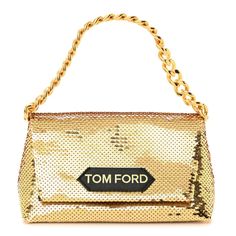 This is an authentic TOM FORD Sequin Mini Label Shoulder Bag in Gold. This chic shoulder bag is crafted of gold leather and sequins. It features a removable gold chain link strap and opens to a black leather interior with card slots. Formal Gold Bag With Gold-tone Logo Plaque, Chic Evening Clutch With Gold-tone Logo Plaque, Luxury Yellow Gold Bags For Party, Luxury Yellow Gold Party Bags, Luxury Gold Bag With Chain Strap, Luxury Yellow Gold Shoulder Bag For Evening, Designer Gold Shoulder Bag For Evening, Party Bags With Gold-tone Logo Plaque, Luxury Shoulder Bag With Gold Chain For Party