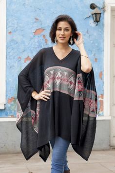 Woven from a lovely cotton blend in a solid black hue this poncho is designed by Peru's Alfredo Falcon. He decorates the center of this mysterious poncho with a stripe that displays subtle geometric patterns in hues of pearl grey and ruby. Single Mothers, Pearl Grey, Alpaca Wool, Gothic Lolita, Solid Black, Bell Sleeve Top, Kimono Top, Geometric Pattern, Cotton Blend