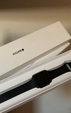 an apple watch is in its box on the table