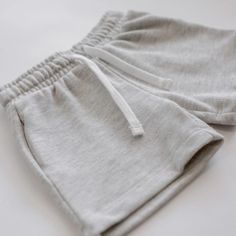 Keep your little one cool and stylish with our Everyday Sweat Shorts! Whether you choose 100% cotton oatmeal or a blend of cotton and polyester heathered grey, these shorts are perfect for a casual outfit aesthetic. All sale items are final sale. Sweat Shorts Outfit Aesthetic, Sweat Shorts Outfit, Casual Outfit Aesthetic, Grey Sweat Shorts, Shorts Collection, Shorts Outfit, Baby Shorts, Kids Ideas, Sweat Shorts