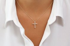 "Cross Necklace / Diamond Cross / 14k Gold Diamond Cross Pendant / Diamond Cross / Religious Necklace / Gold Cross Necklace / Birthday Gift Item Details * Made to Order. * Gold Kt: 14K * Choice of Gold Color: Rose Gold, Yellow Gold, White Gold * Round Diamond: 1.6 MM * Total Number of Stones: 11 * Total CTW: 20 ctw * Diamond Color Clarity: G Color SI Clarity * Setting Type: Bezel * Ready to Ship in 7-10 Business Days If you have any additional questions about this ring, just hit the \"Ask a Ques Elegant Sterling Silver Cross Necklace, Elegant White Cross Necklace Pendant, Elegant White Pendant Cross Necklace, Elegant White Cross Pendant Necklace, Elegant White Crucifix Necklace, Classic Diamond White Cross Necklace For Gifts, Diamond Pendant Cross Necklace For Anniversary, Elegant Diamond White Cross Pendant Necklace, Elegant Diamond Cross Necklace For Gift