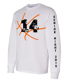 a white long - sleeved shirt with an orange and black design on the chest