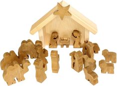 a wooden nativity scene with figurines and figures